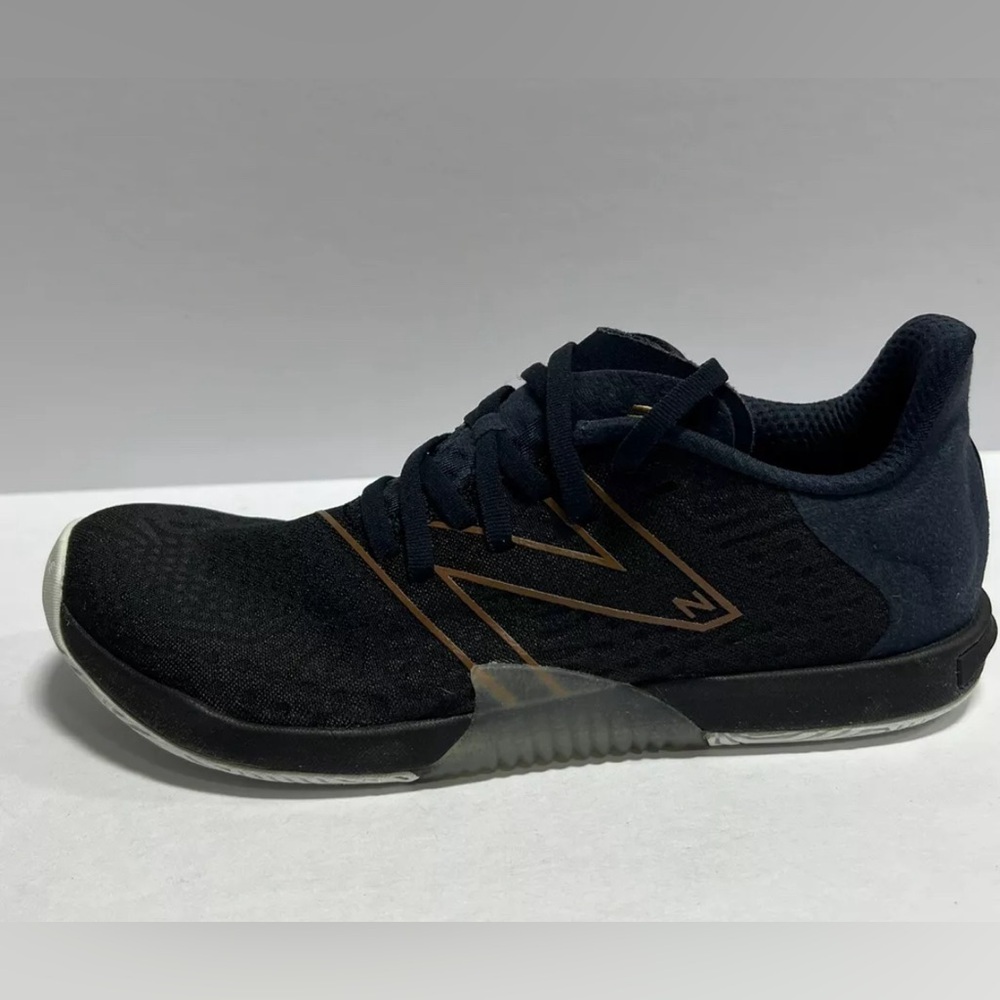 New Balance Black Athletic Sneakers with Brown Accents